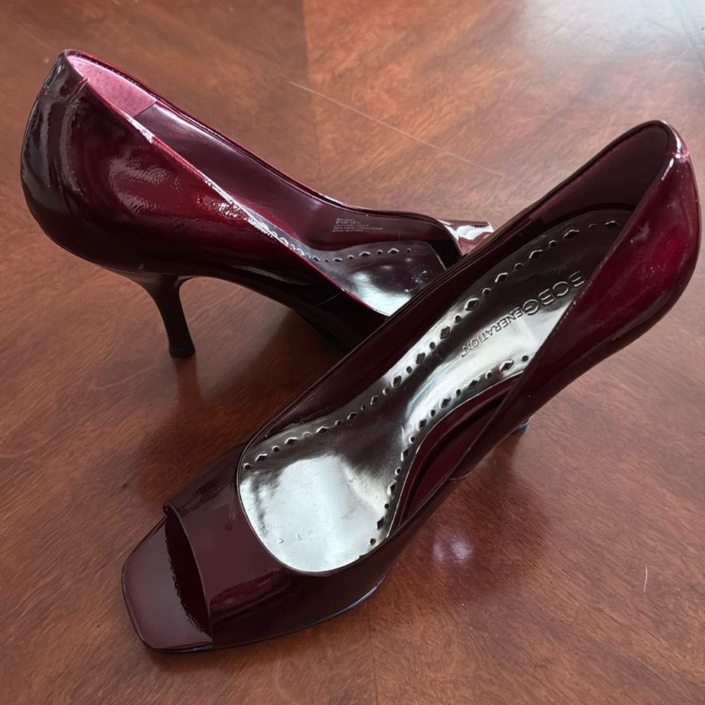 Beautiful red BCBGeneration open toe shoes 4in heels size 8 1/2 New without box.